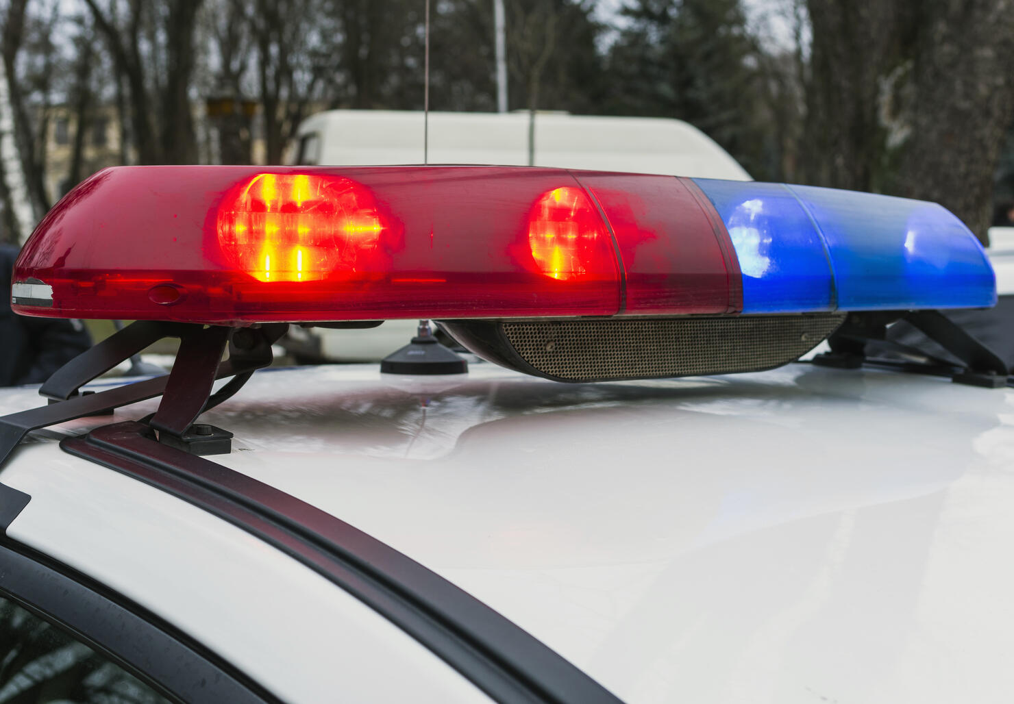 Red and blue police car lights. Patrolling the city, crime scene. Emergency lights. Selective focus.
