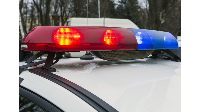 Red and blue police car lights. Patrolling the city, crime scene. Emergency lights. Selective focus.