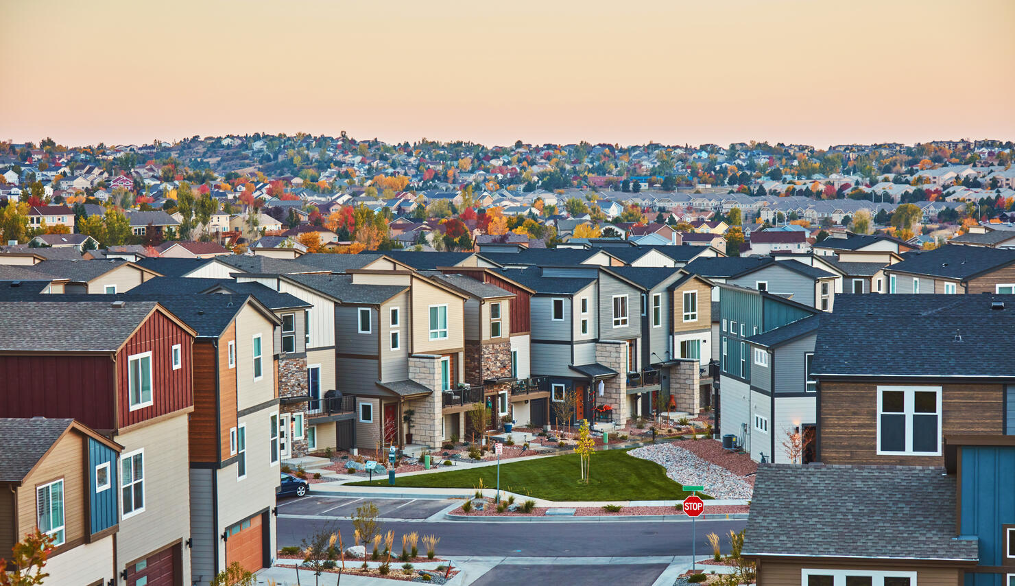 Residential area with multiple homes in Colorado, USA at sunrise