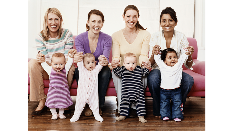 Portrait of Four Young Mothers with Their Babies