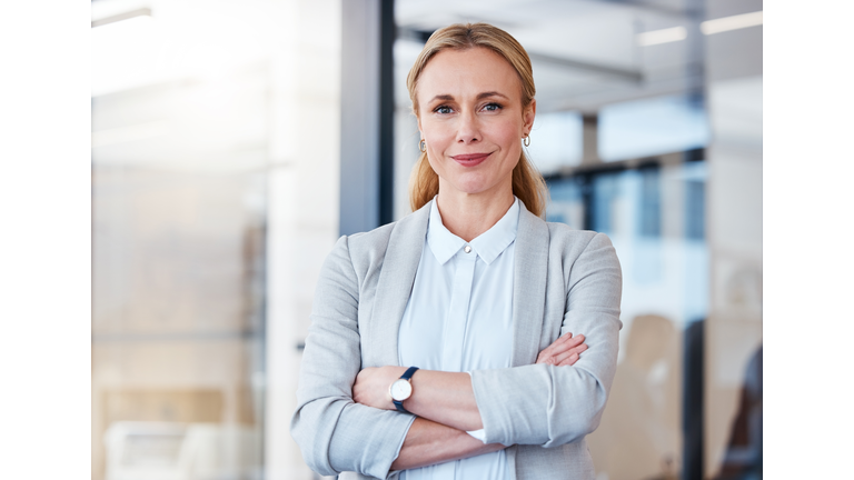 Portrait of a confident mature businesswoman working in a modern office