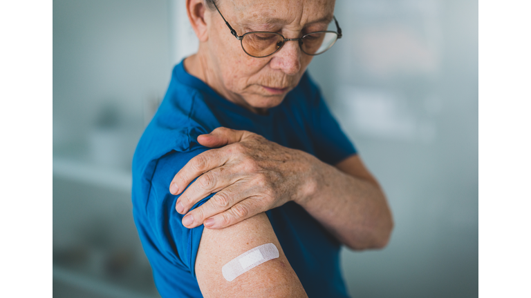 Senior woman right after getting covid-19 vaccine