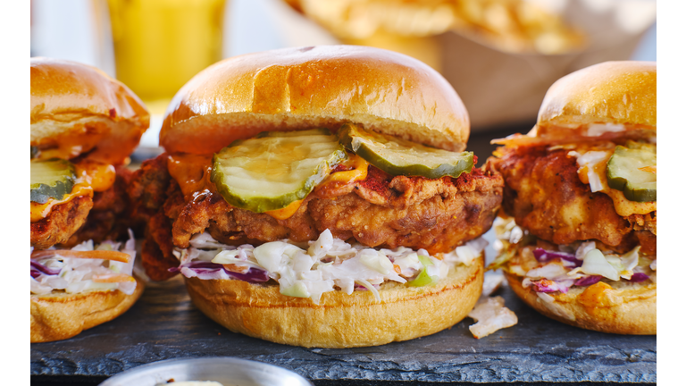 spicy nashville hot chicken sandwich with coleslaw and pickles