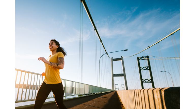 Young Woman on Morning Run in Urban Setting