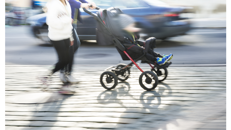 Young couple with pram