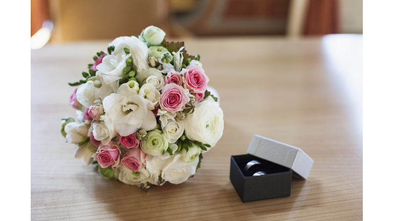 Close-up of wedding ring with bridal bouquet, Munich, Bavaria, Germany