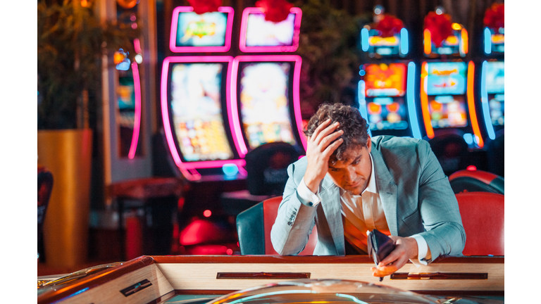 Man loosing his money in the casino