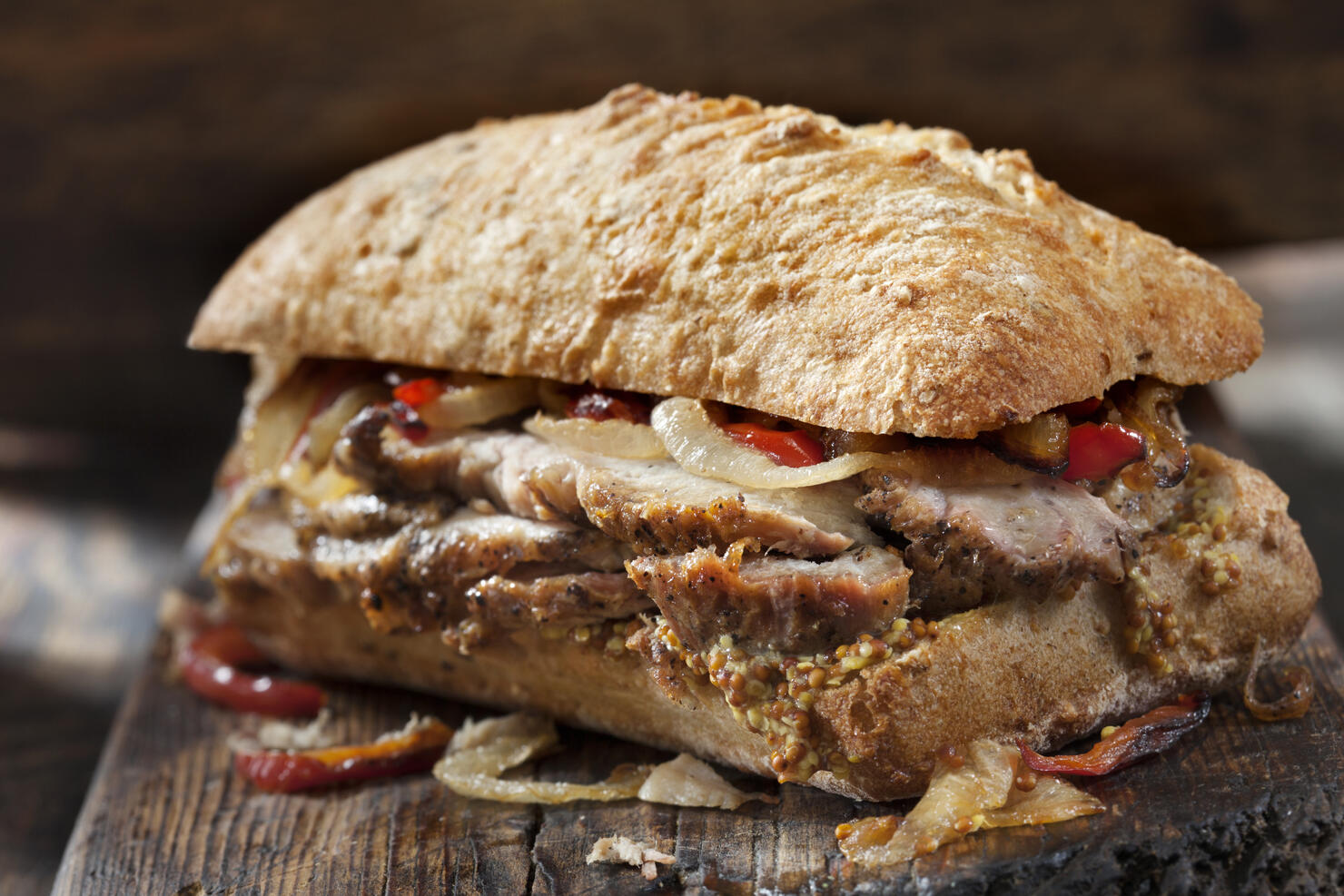 Roast Pork Sandwich with Grilled Peppers, Onions and Grainy Mustard on Ciabatta Bread