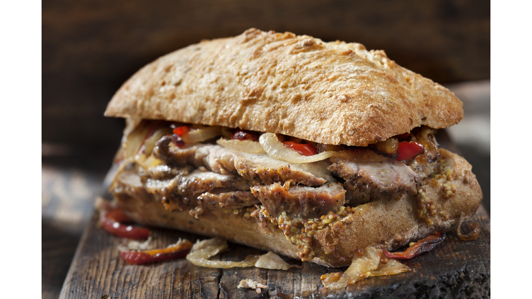 Roast Pork Sandwich with Grilled Peppers, Onions and Grainy Mustard on Ciabatta Bread
