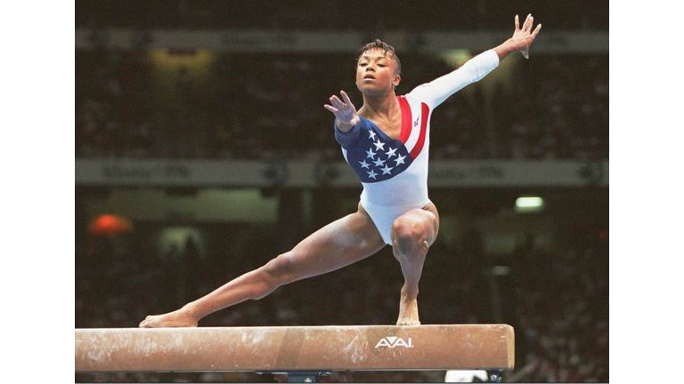 US Olympic team gymnast Dominique Dawes practices
