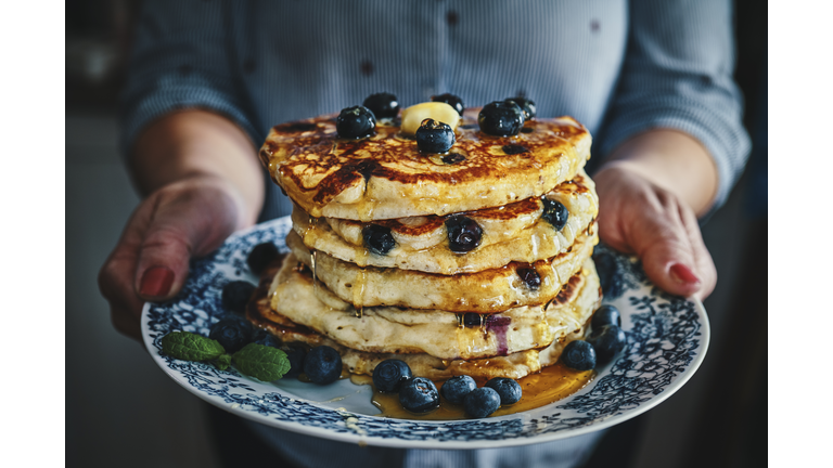 Stack of Pancakes with Maple Syrup and Fresh Blueberries