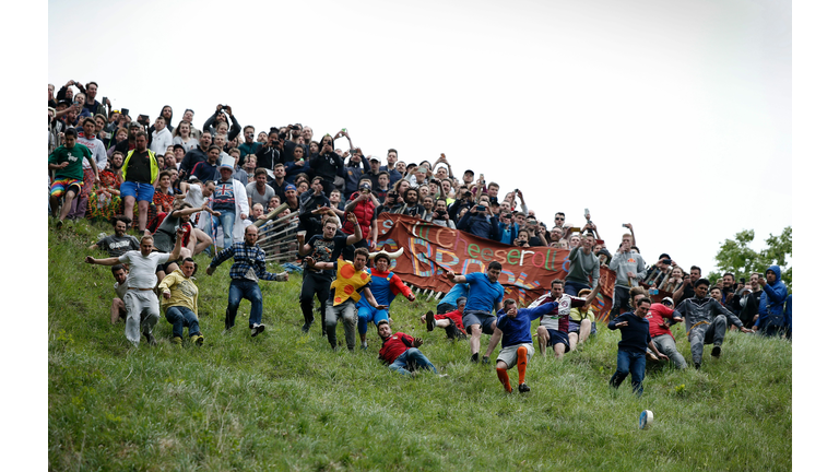 BRITAIN-TRADITION-CHEESE ROLLING-OFFBEAT