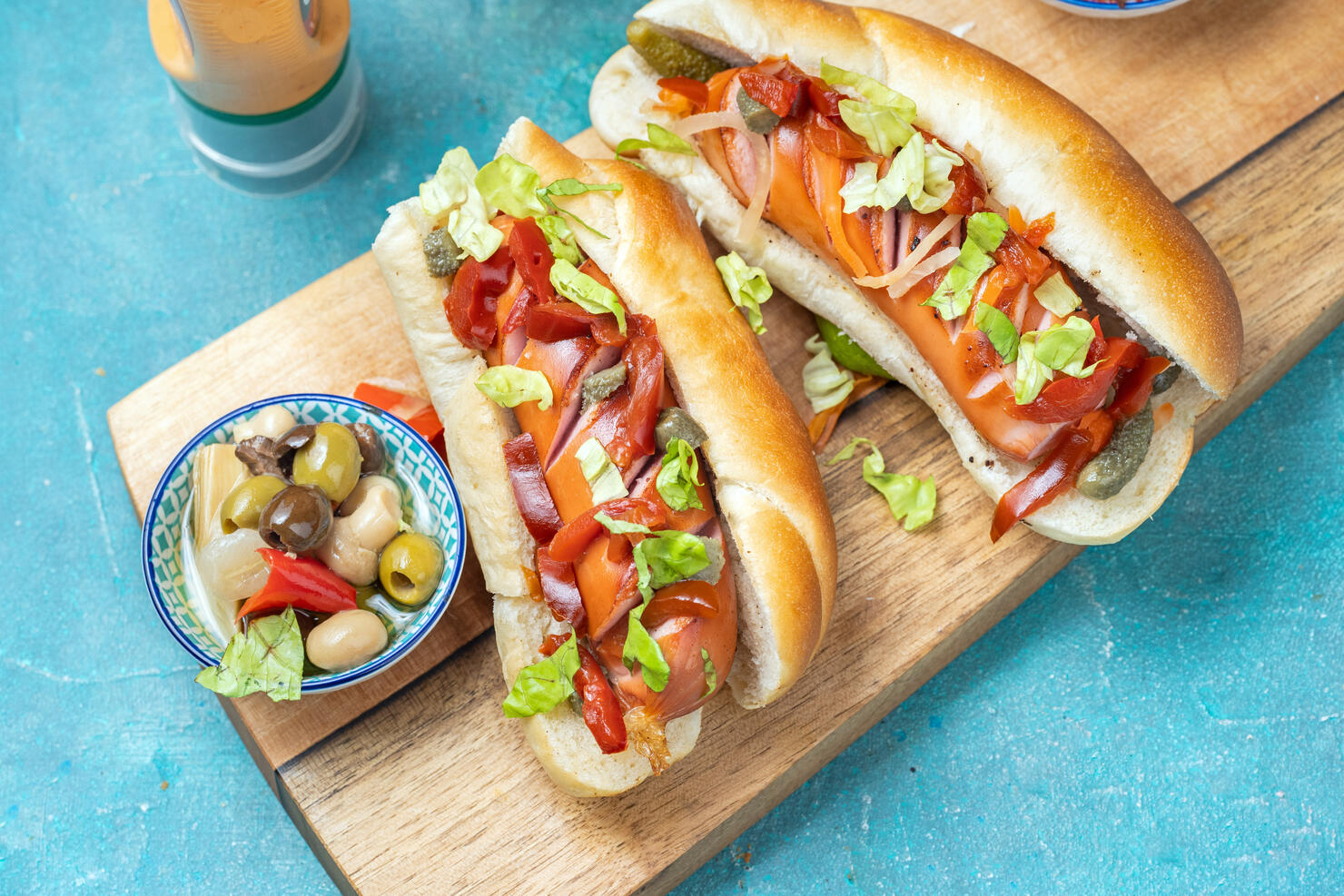 Hot dog with pickled on a chopping board