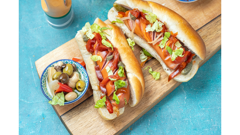 Hot dog with pickled on a chopping board