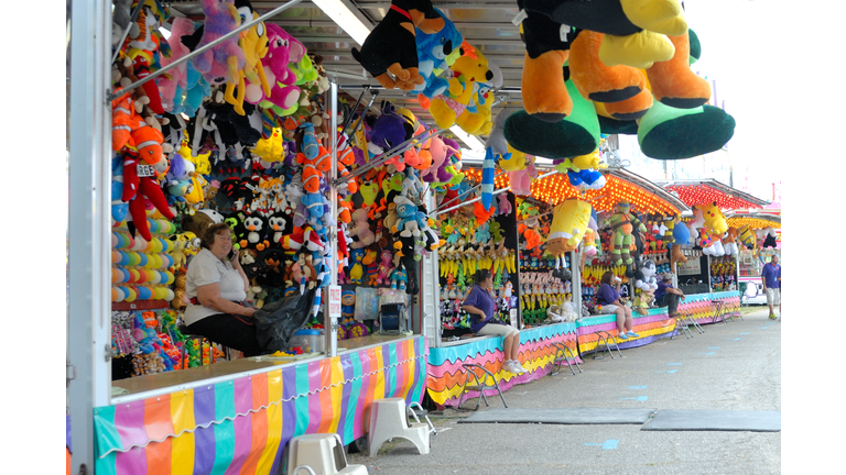 Game vendors do their business on the midway