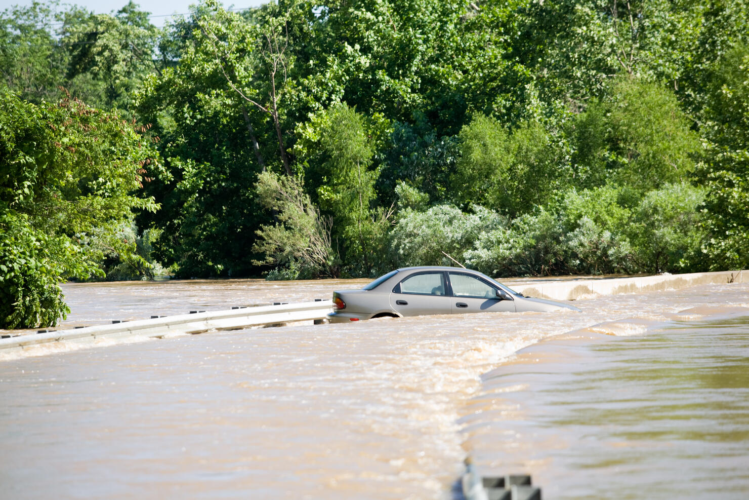 Car In Flooded River