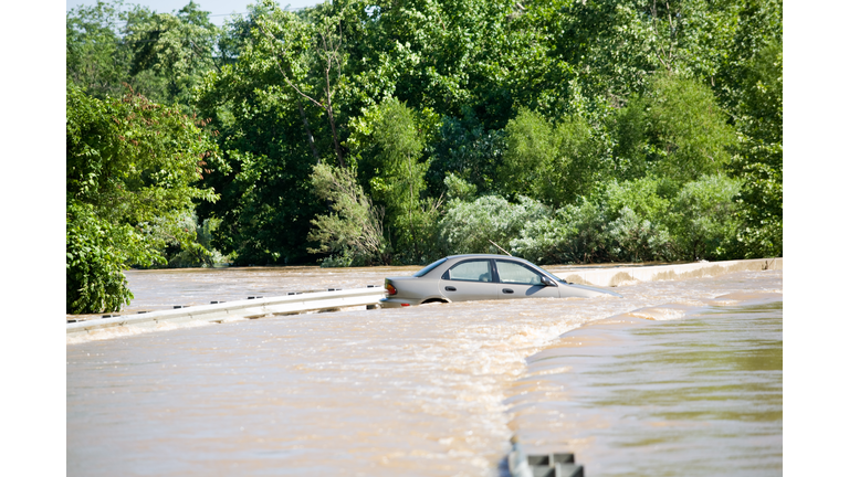 Car In Flooded River