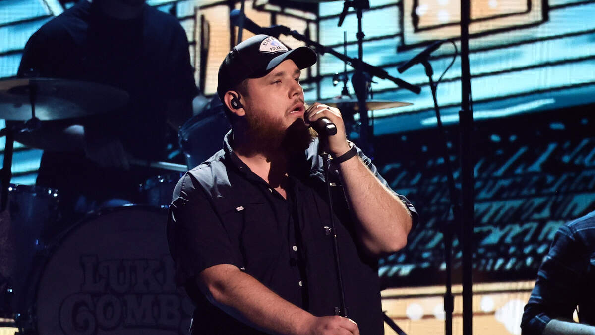 Luke Combs Shotguns Beer With NFL Superstar Patrick Mahomes