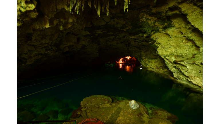 The ferry in the cave leading to a hidden karst lake
