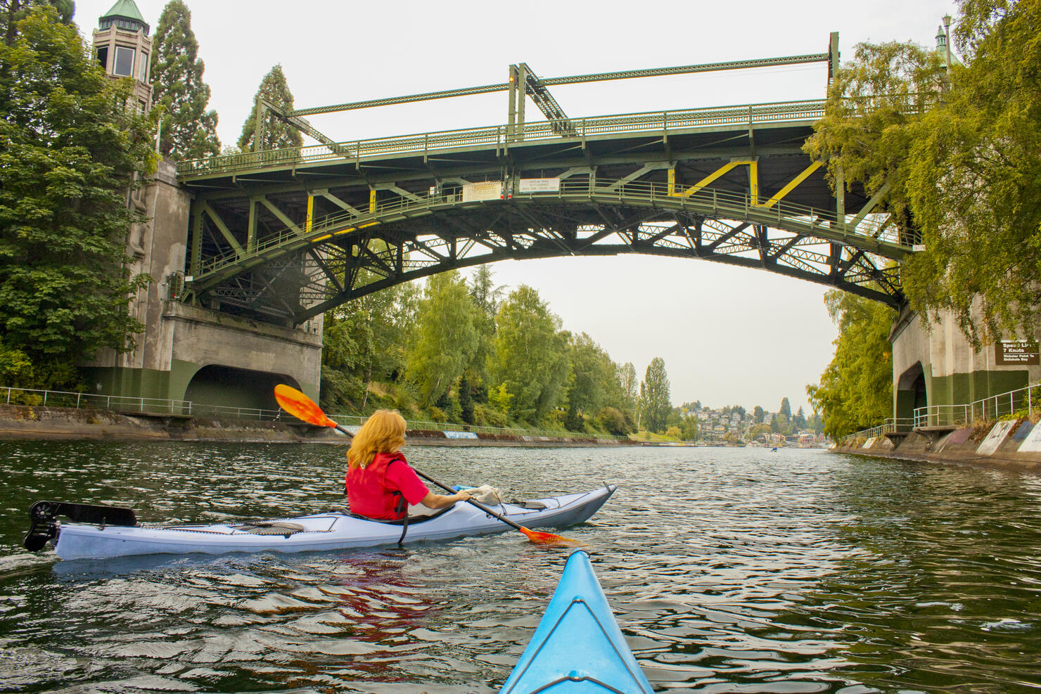 Woman kayaking in Seattle, WA.
