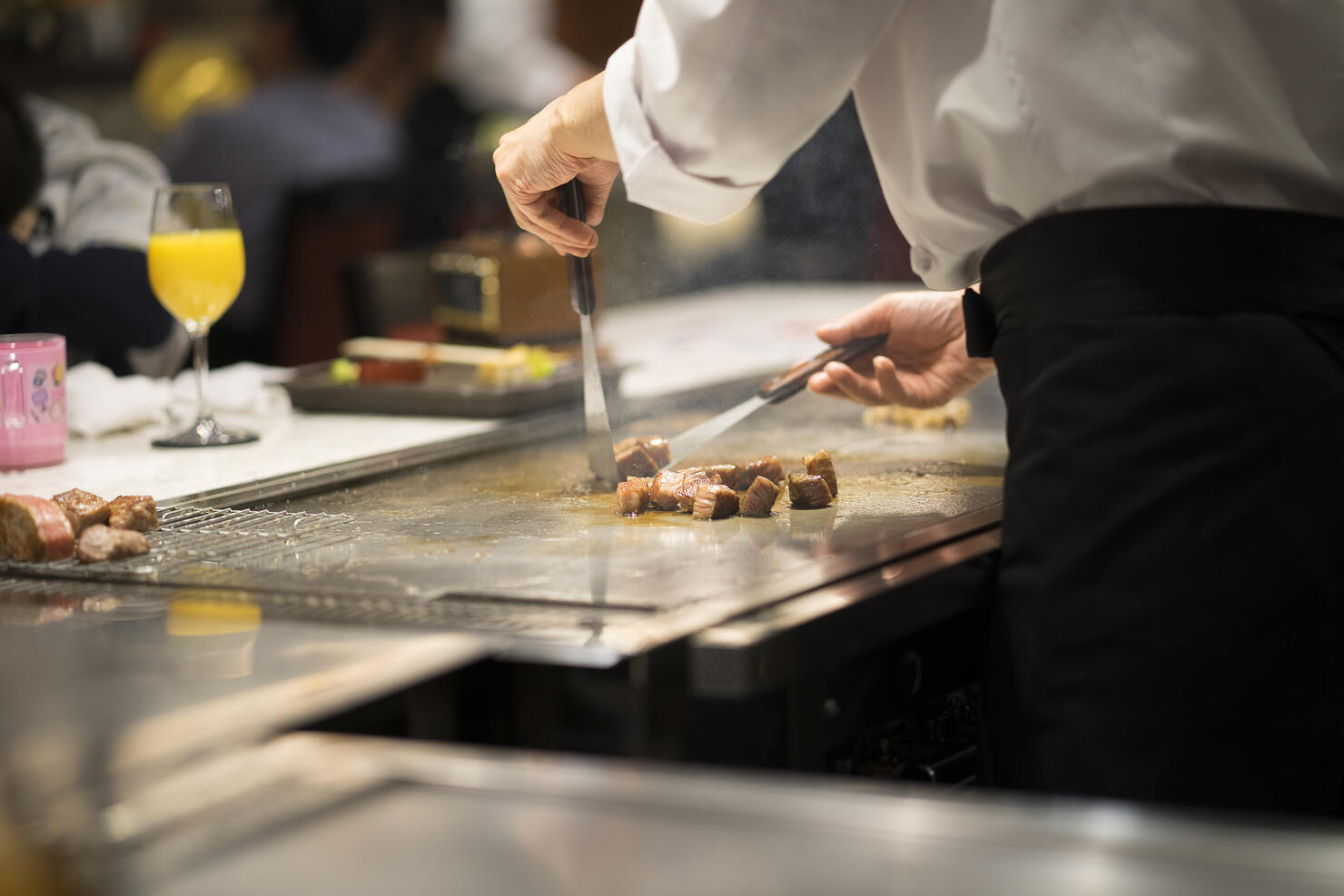 Japanese Chef Cooking Beef for Client teppanyaki style