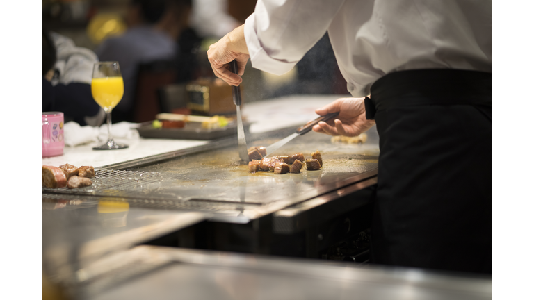 Japanese Chef Cooking Beef for Client teppanyaki style