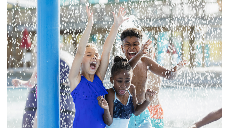 Group of children playing at a water park