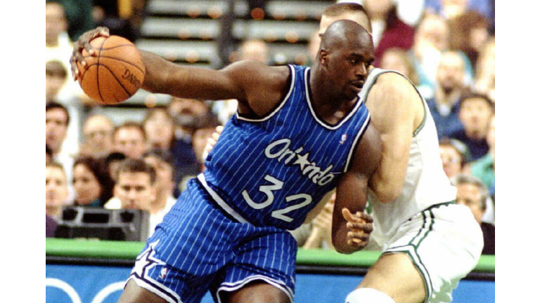 Shaquille O'Neal of the Orlando Magic drives past