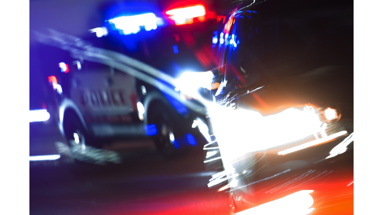 Hot Pursuit Police Traffic Chase at Night