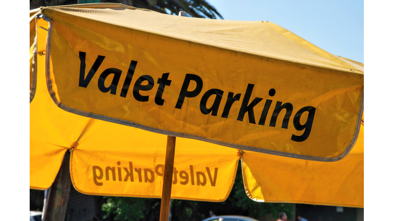 Umbrella valet parking stand