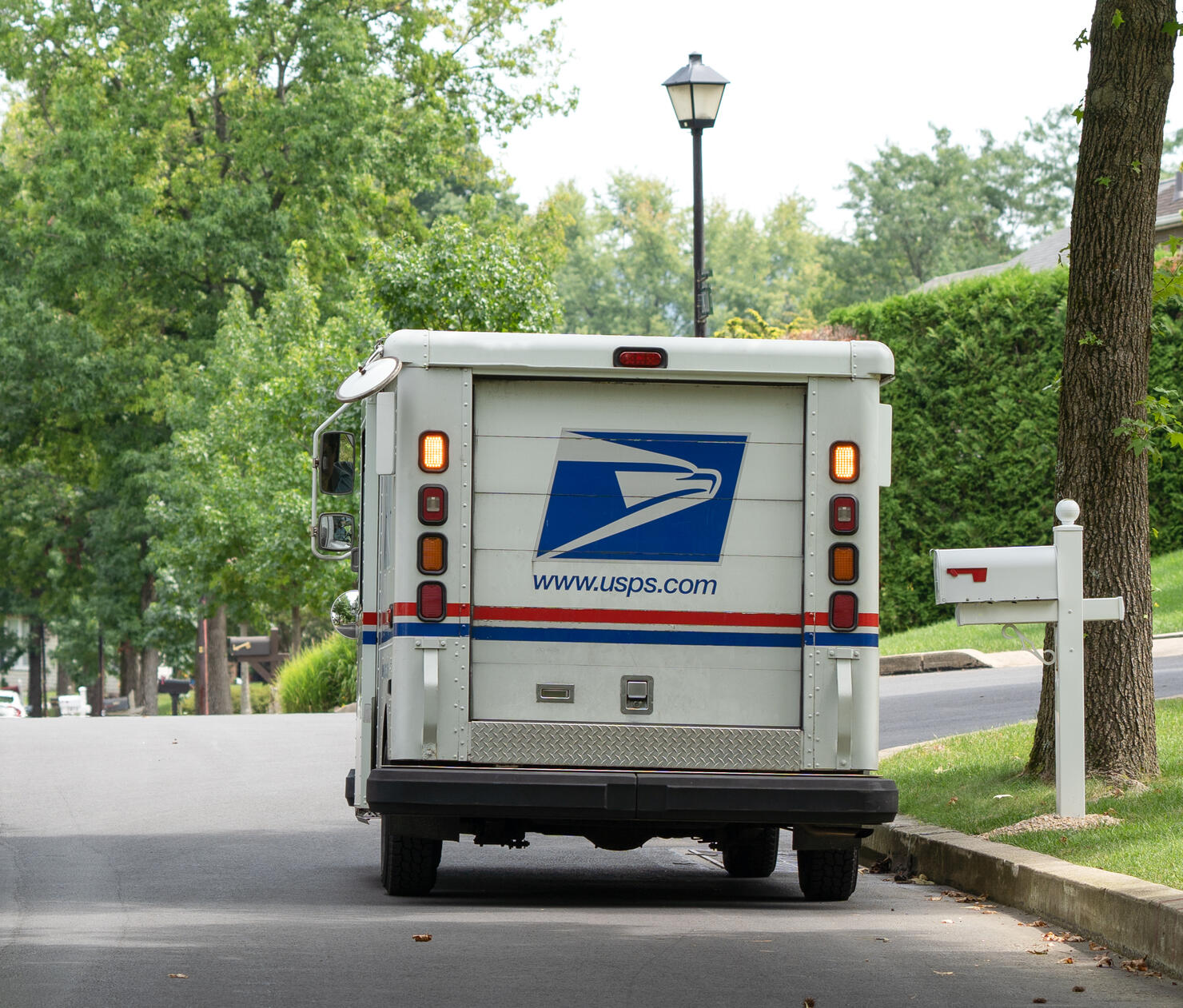 USPS Mail Truck on Suburban Street