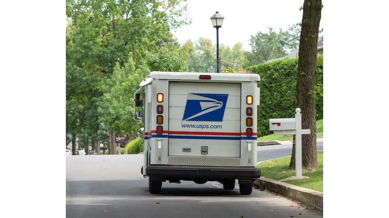 USPS Mail Truck on Suburban Street