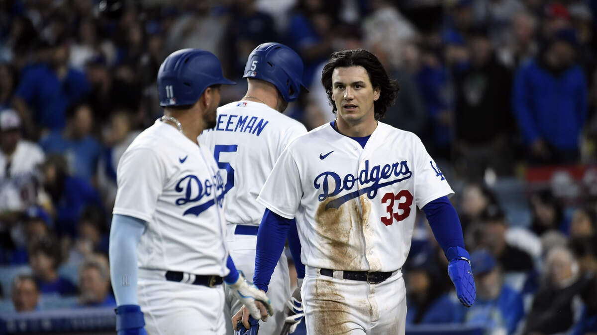 Former Los Angeles Dodgers known as The Infield Ron Cey (L to R), Bill  Russell, Davey Lopes and Steve Garvey take the field to throw out the  ceremonial first pitch prior to