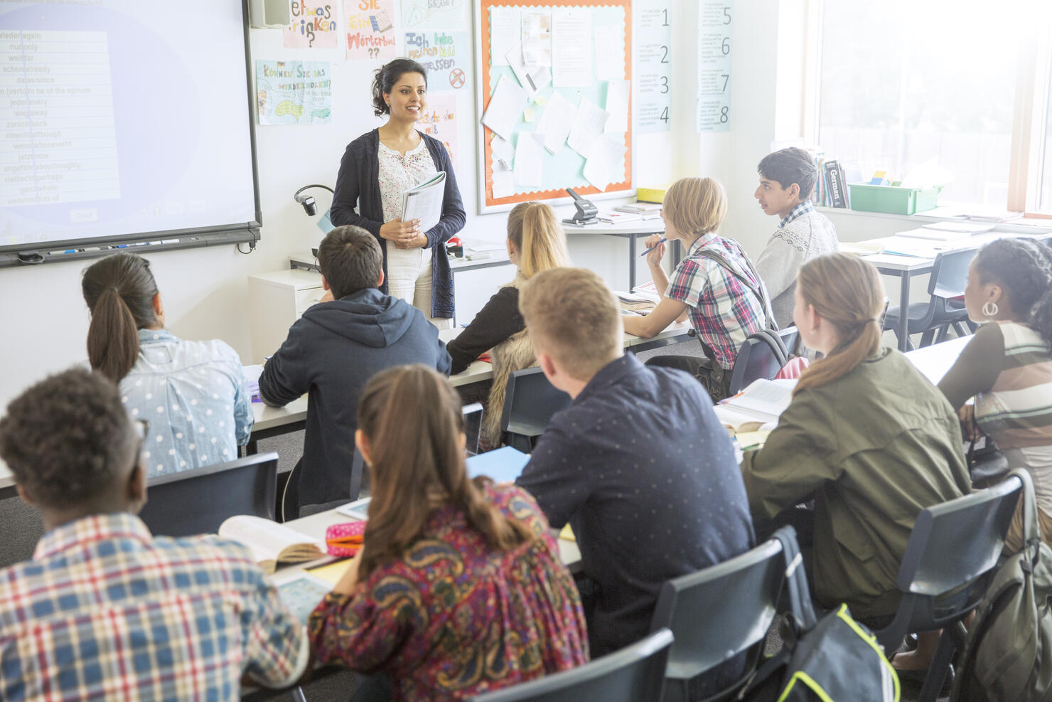 Teacher and students in classroom during lesson