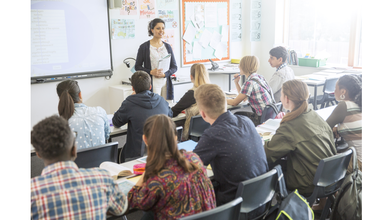 Teacher and students in classroom during lesson