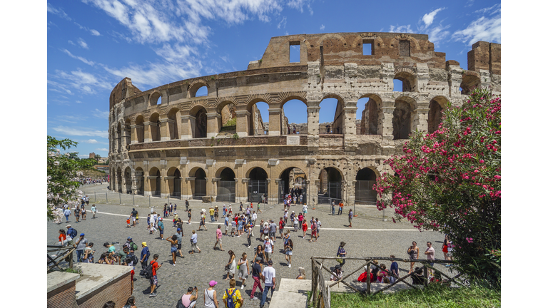 the monumental facade of the Colosseum, the largest Roman amphitheatre ever built and one of Rome's most iconic tourist attractions, June 28, 2018