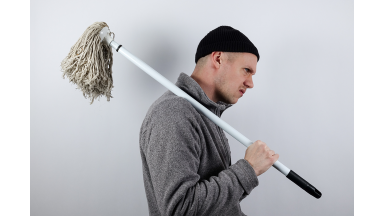 Grumpy cleaner who is tired of his job