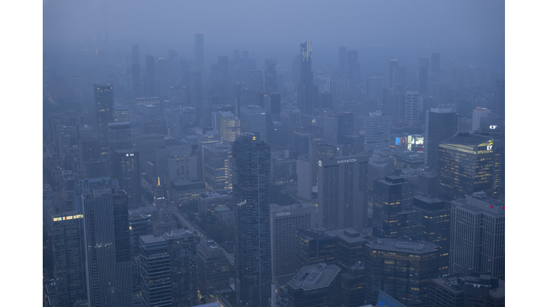 Toronto Shrouded In Hazy Skies From Hundreds Of Wildfires Burning In Northern Canada