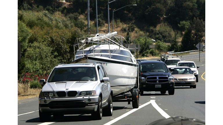 Scores Of Travelers Depart For Long Holiday Weekend