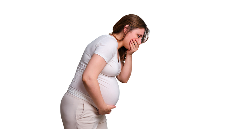 Heartburn in throat in pregnant woman, studio shot on white background