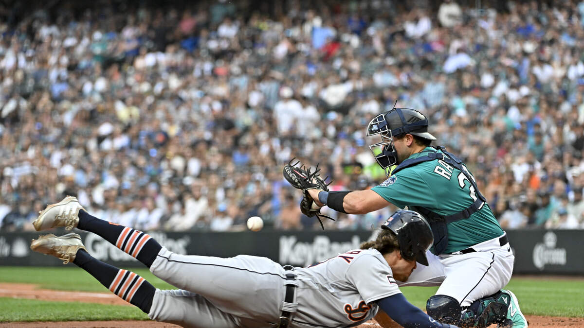 Carpenter homers twice to help Lorenzen and the Tigers beat the Mariners 6-0