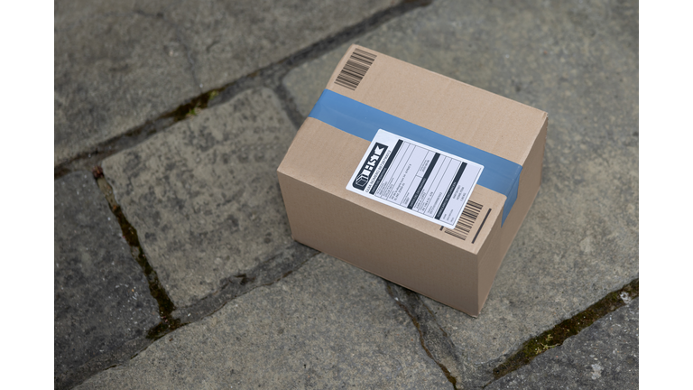 Close-up on a delivery package on the floor