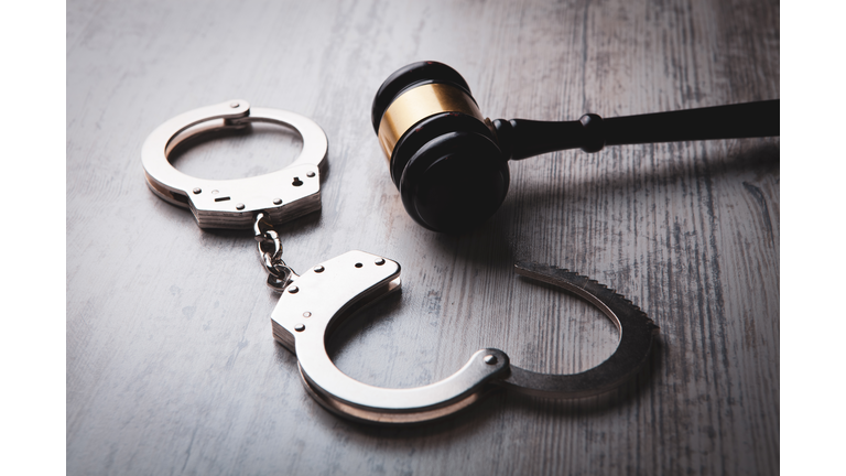 Legal law concept image - gavel and handcuffs