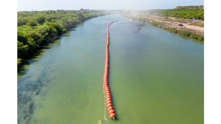 Texas Deploys Buoys Into Rio Grande River To Deter Migrants