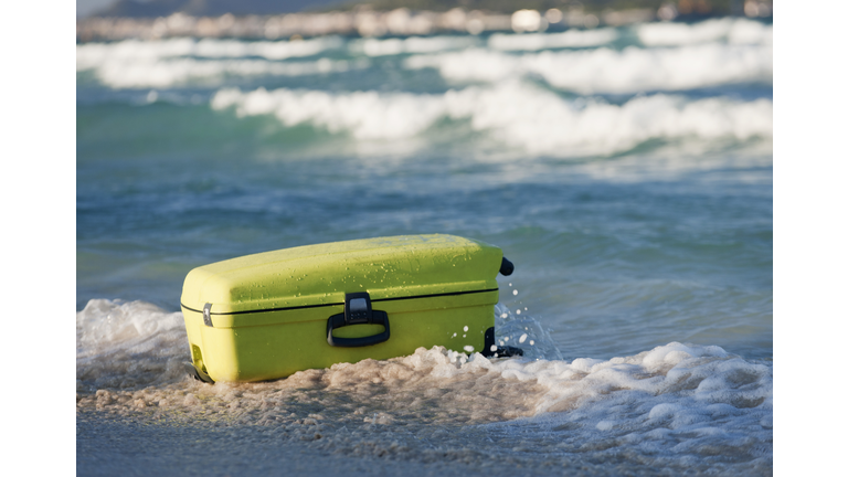 Suitcase on beach