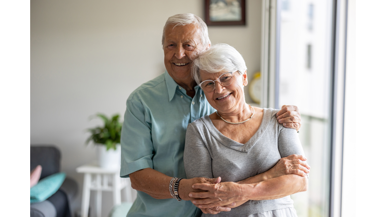 Happy senior couple at home