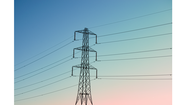 Low angle view of electricity pylon against clear sky,River Ver Trail,St Albans,United Kingdom,UK