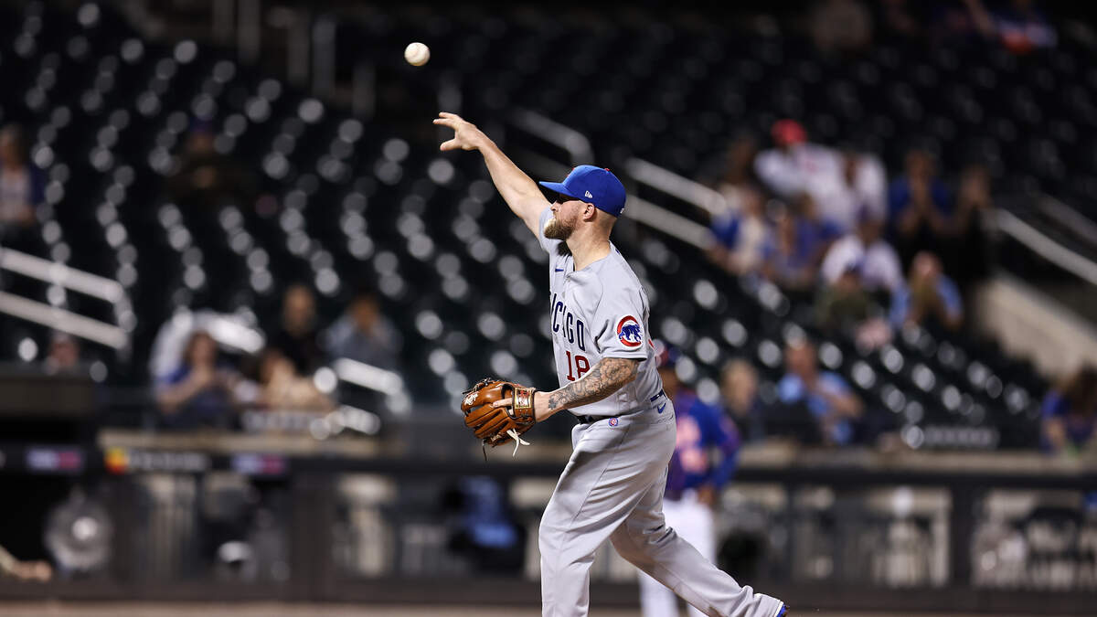 Chicago Cubs catcher Tucker Barnhart (18) laughs after walking off the  mound after he pitched against the New York Mets during the eighth inning  of a baseball game, Monday, Aug.7, 2023, in