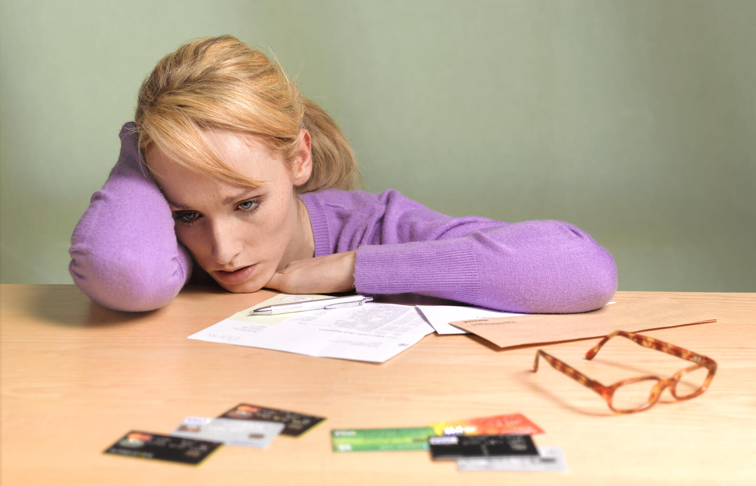 Girl with credit cards and debt