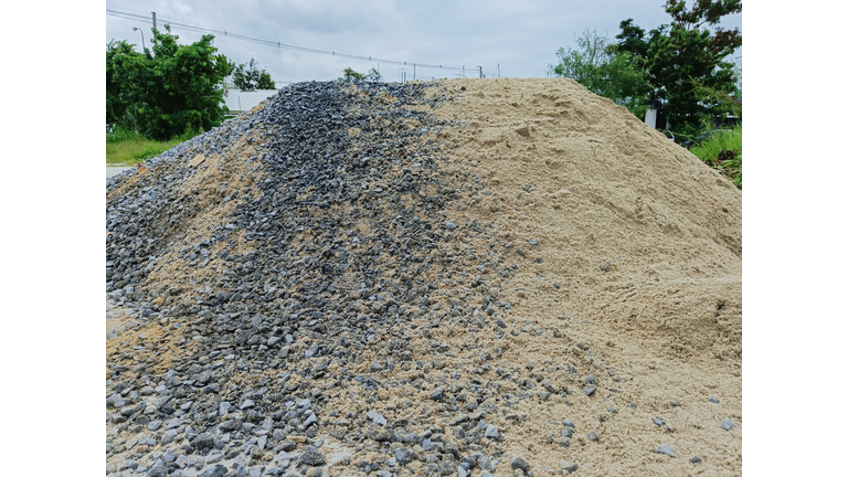 Pile of gravel or stone and sand for construction